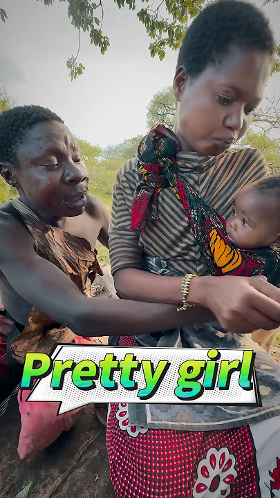 Pretty girl in hadzabe tribal #pretty #mother #newborn #funny #eating