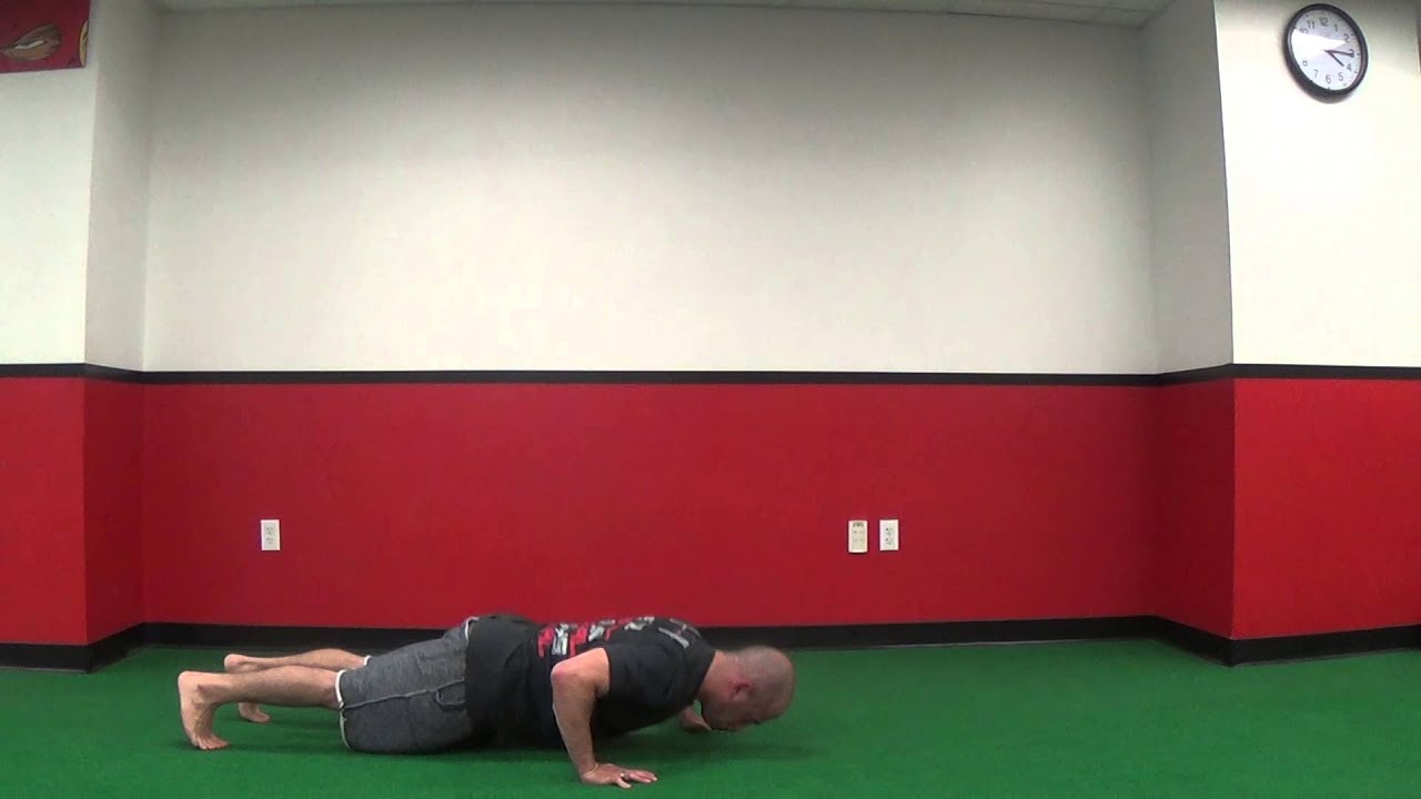 How To Do A STAGGERED PUSH UP  Exercise Demonstration Video and Guide 