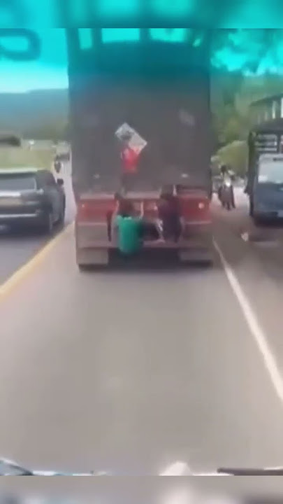 The moment the squirrel jumps and is chased by the truck conductor