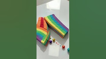 AI ASMR : rainbow kinetic sand being sliced