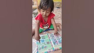 Rania belajar tebak gambar di teras
