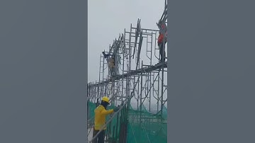 Lắp dựng giàn giáo bao che nhà cao tầng