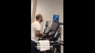 Guy Enjoying His Treadmill Workout By Playing Call Of Duty