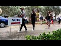 Early voters line up in battleground Florida