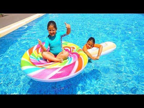 Öykü and Masal play in inflatable giant candy - fun pool