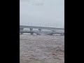 Cars Washed Down After Bridge Collapses