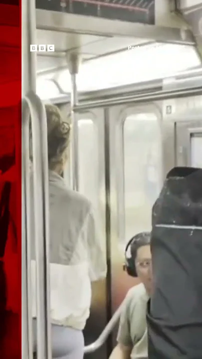 Passengers on New York subway surrounded by water after flash flooding hits city. #BBCNews