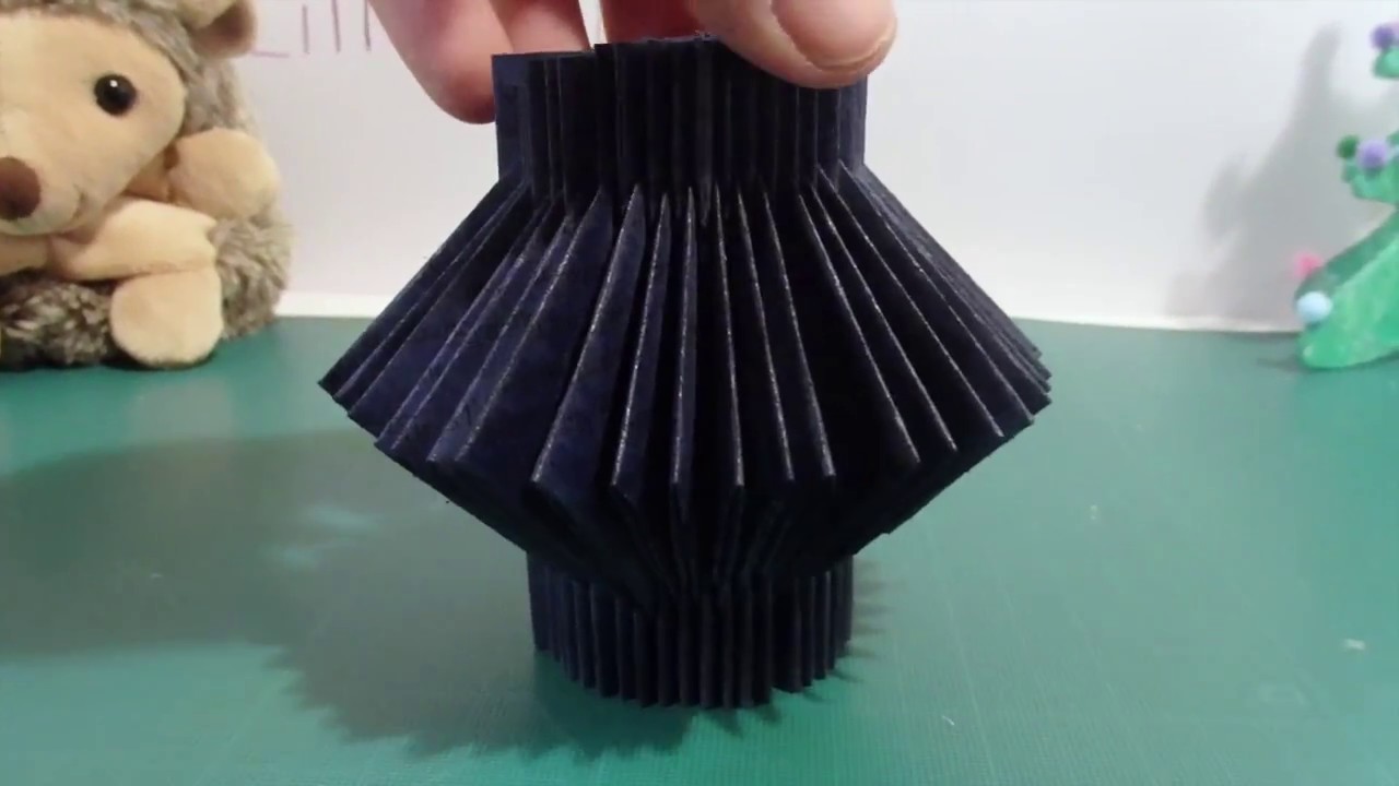 @  MOBILE AVEC PERLES BLEUES PLIAGE LIVRE  @