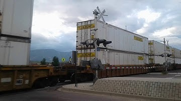 BNSF intermodal double stack train with J.B. HUNT CONTAINERS