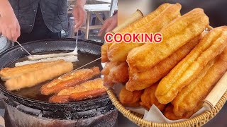 Cooking deep fried dough sticks, Chinese street food. #cooking #food