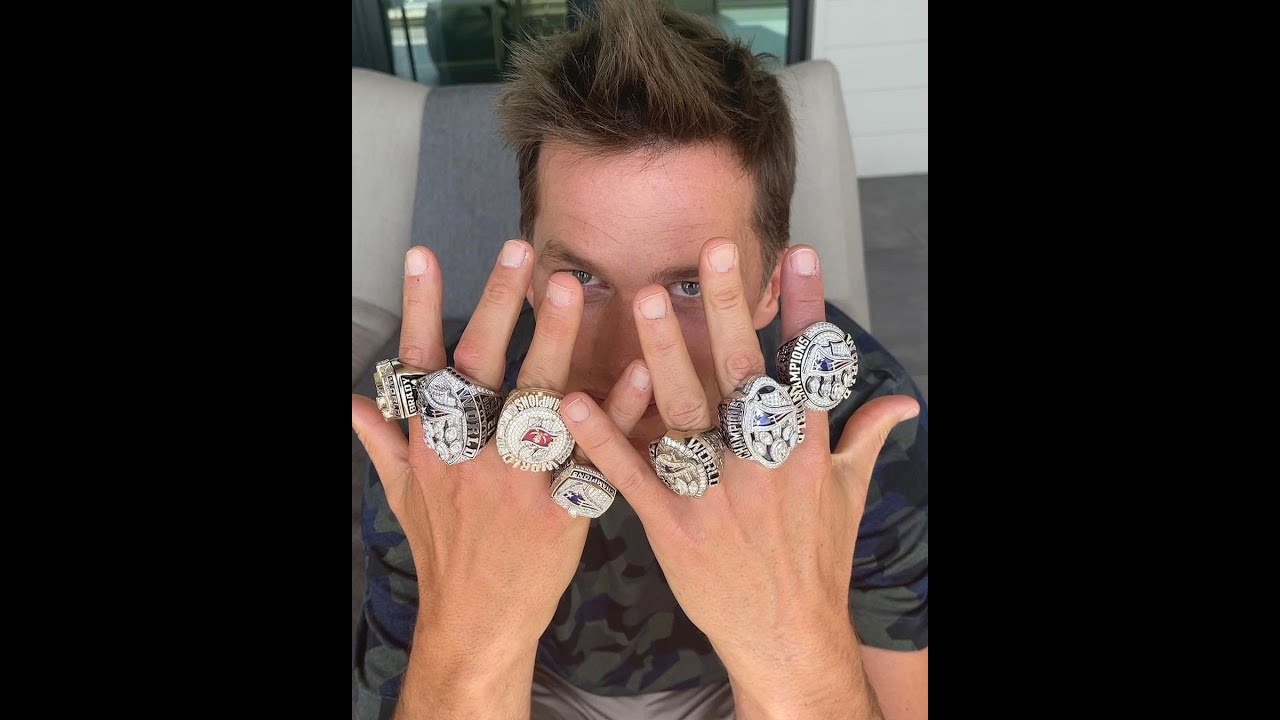 tom brady showing rings