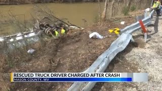 WVSP: Rescued truck driver charged in Mason County rollover crash