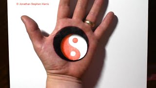 trick art on hand cool 3d yin yang hole optical illusion