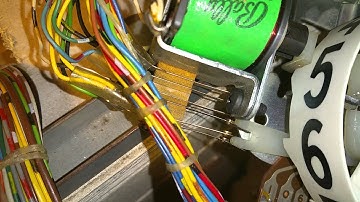 Adjusting pinball machine score reel