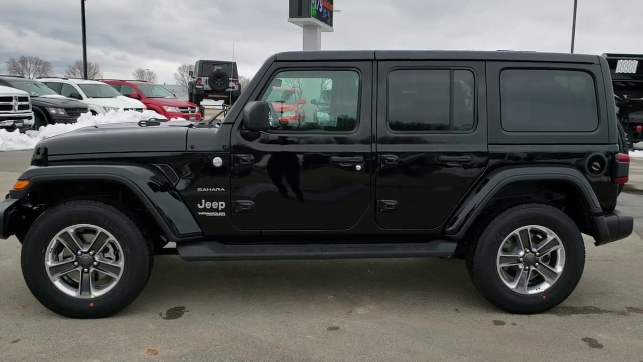 Descubrir 106+ imagen black jeep wrangler unlimited sahara
