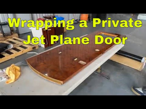 Wrapping a Private Jet Plane Door with 3M Di-Noc Architectural Film