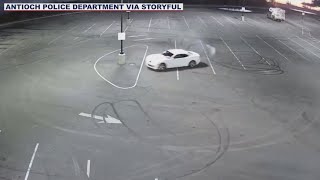 Driver does donuts, crashes into light pole