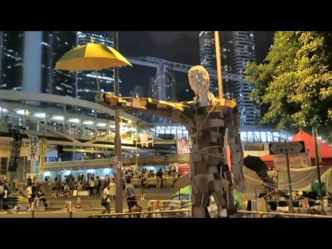Hong Kong Protests. The John Lennon Wall, Umbrella Man Statue and "689" under the Feet
