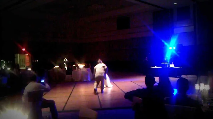 Sarah Rawley and her dad dance at her wedding rece...