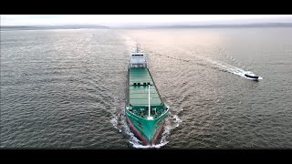 DJI MINI 4 PRO FLIGHT TAKING OFF FROM A SAIL BOAT TO INTERCEPT A FREIGHTER