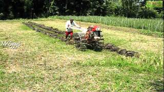 Kubota 2 Wheel Tractor Plowing Farm Field