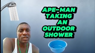 Taking An Outdoor Bucket Bathingshower.