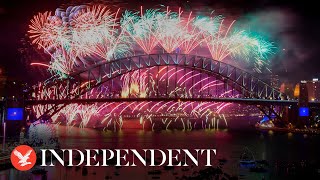 Live: Australia welcomes in 2024 with New Year's fireworks over Sydney Harbour