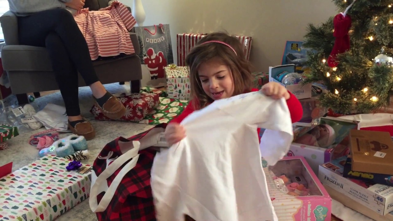 Sophia Opening & Quickly Folding Her Christmas Presents - YouTube