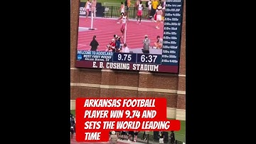 Thumbnail of Arkansas football player win 9.74 and sets the world leading time