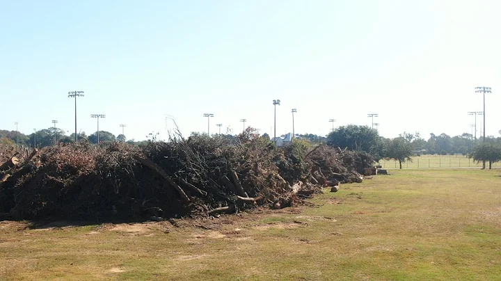 Citizens Park becomes host of a massive debris pile as cleanup efforts continue