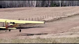 Orange Tractor and a Cessna 150 TD