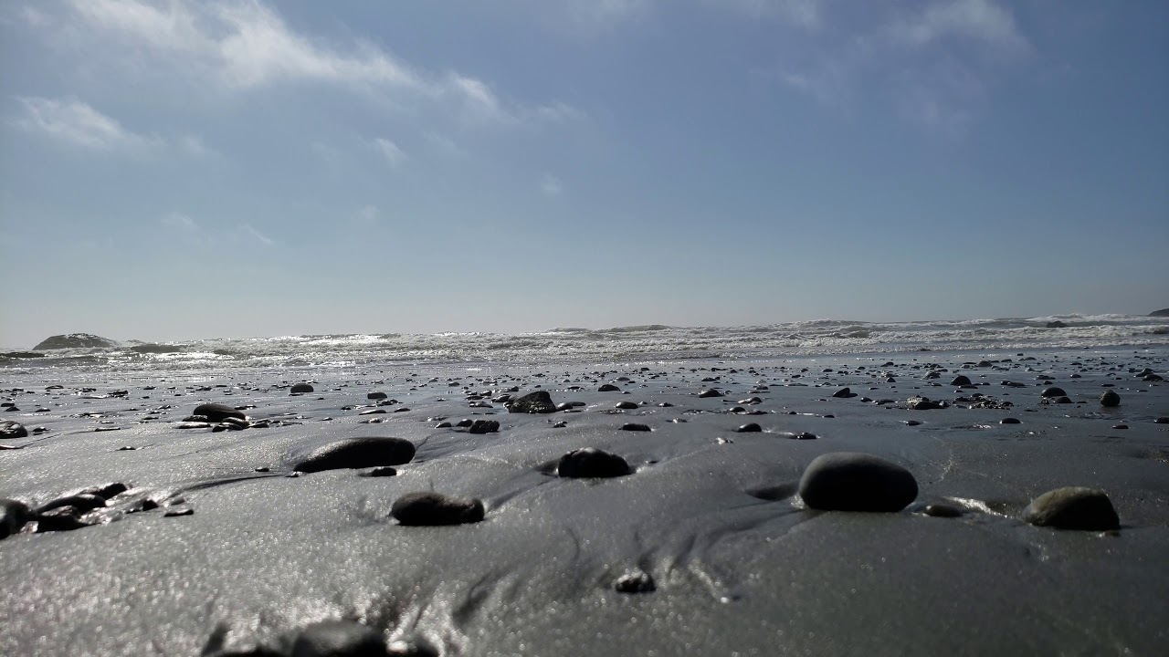 Two Minutes of Nature - Buried rocks on the beach - YouTube
