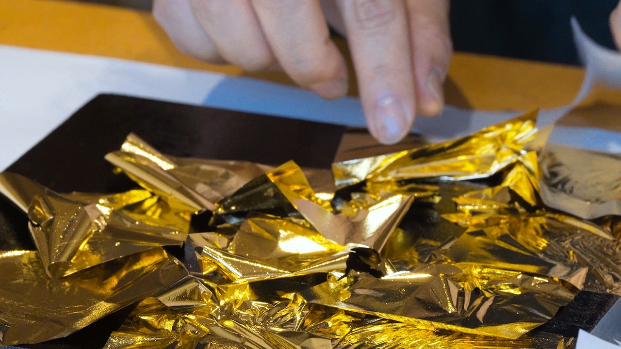 Explore gold leaf-adorned lacquerware at 