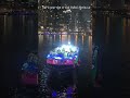 Lights, water, and Dubai skyline coming alive at night. Dubai Marina, Dubai, United Arab Emirates