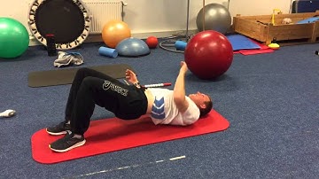 Glute bridge - rotate & reach