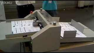 Paper creasing machine