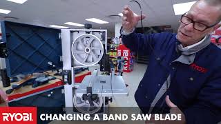 Changing a band saw blade.