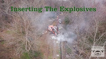 Aerial View with Drone of Blasting Rock in the ground with explosives for a sewer line