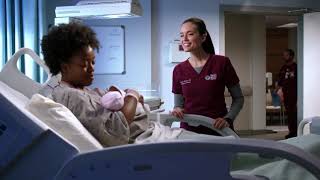 Dr Manning defends a woman and her newborn baby from a police officer in order to prevent separation
