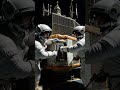 Astronauts Repairing Space Equipment in Stunning Realism #SpaceExploration #AstronautLife #EVA