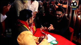 Prabhas shows his hands to Pandit for Radhe Shyam Movie Success at Trailer Launch