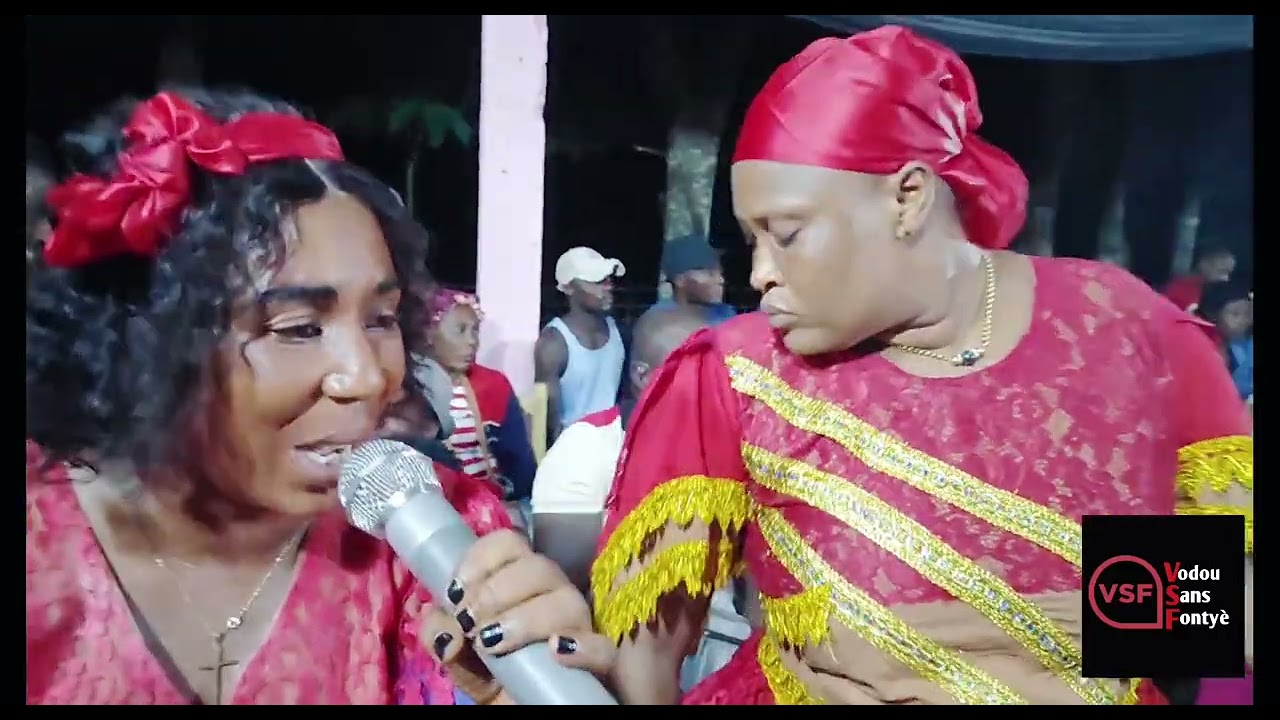 Ougan Daniel ak lwa nan tet li kap fe koze nan lakou kelange