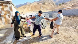 Preparing the garden for summer by Omid and his family
