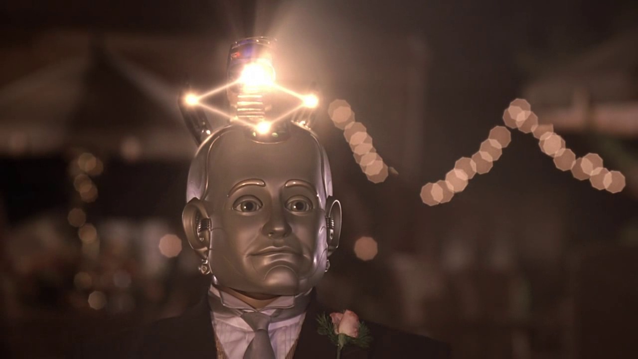 The robot steward wants to appease its master, the daughter dances with her father that the sence is