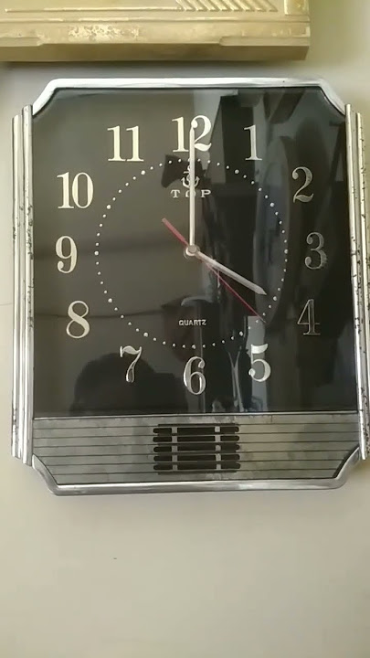 jam dinding top quartz iftakhul amin