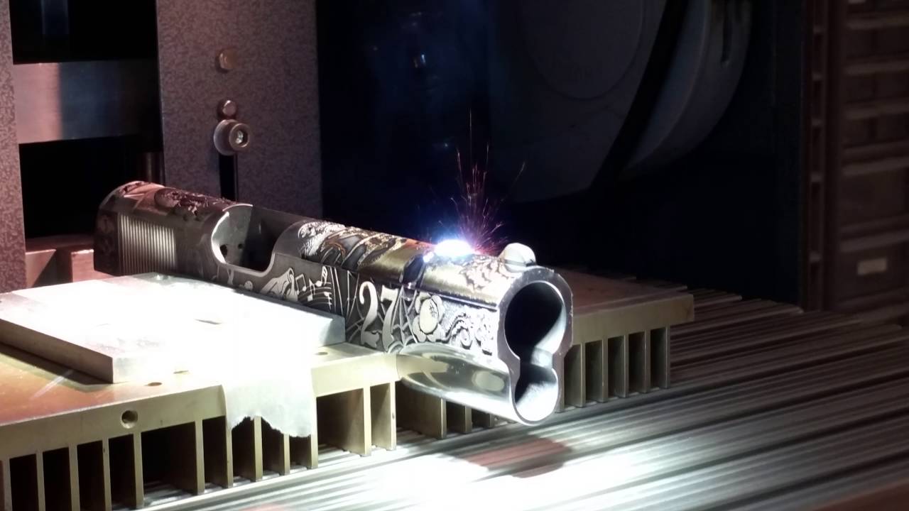Laser engraving a 3D design on 1911 slide with Z Tech's QM plus Series high power laser YouTube