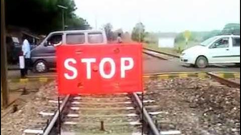Railway safety at Non-Interlocked manned Level crossings by providing Automatic Bannerflag