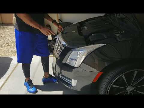 No tool ,Cadillac XTS head light bulb replace less than 5 minutes both sides.