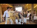 Crazy groomsmen dance for the bride!