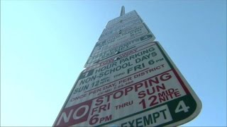 Signage outside of school causing 15 feet of confusion